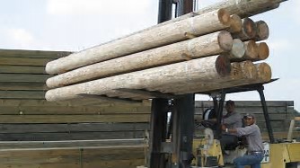 wood poles fork lift
